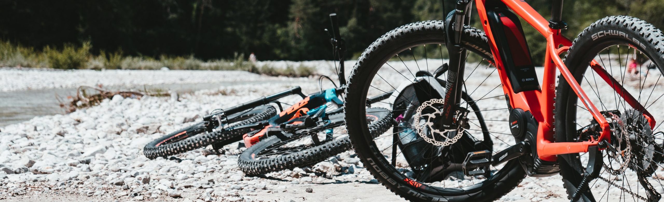 bicycles parked near a river