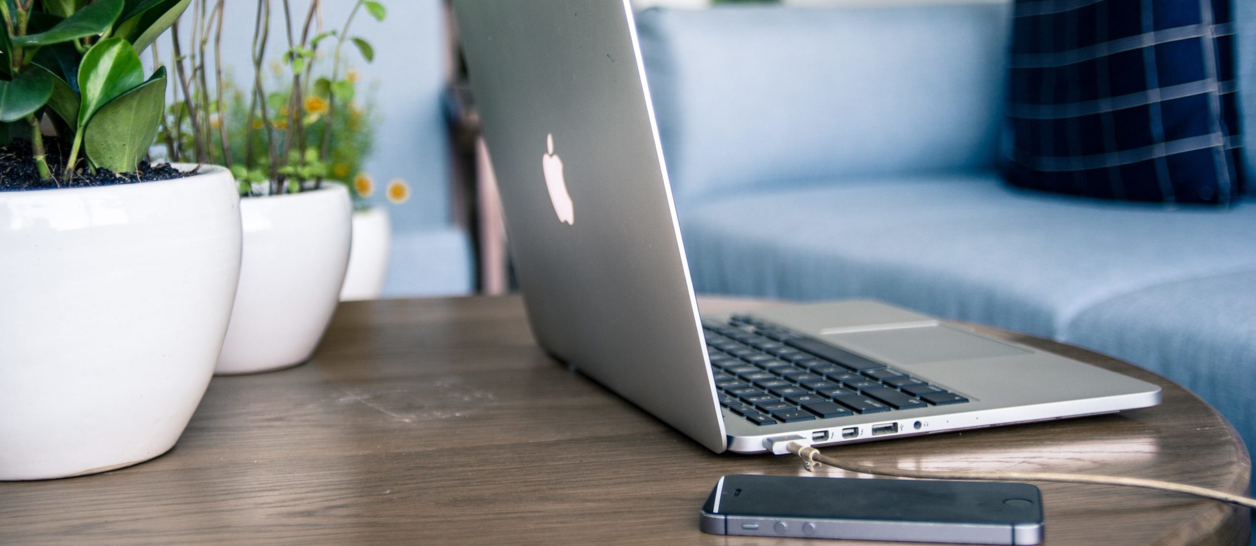 laptop and phone on a table